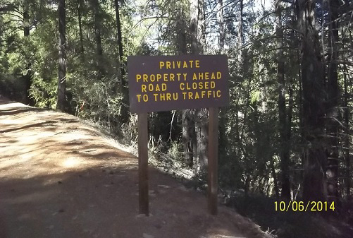 Sign: Private Property. Road Closed To Thru Traffic.
